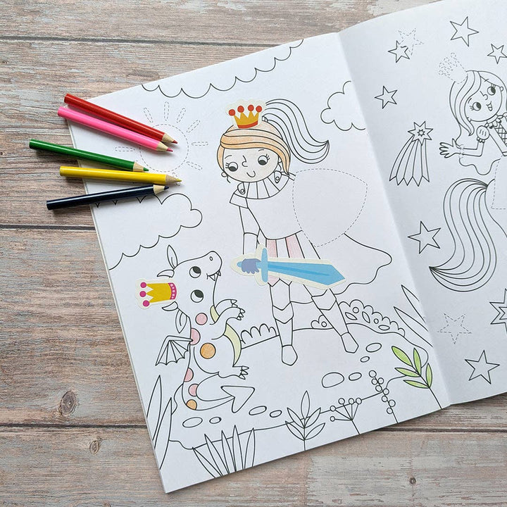 Child using Dress Me Up Princess colouring and activity book