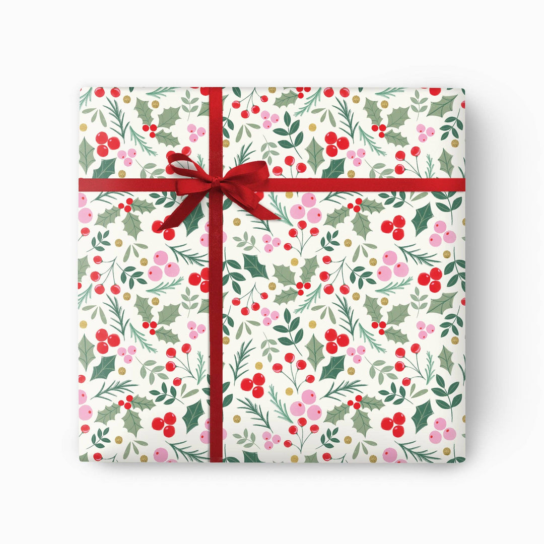 Berry and holly Christmas wrapping paper with red berries and greenery