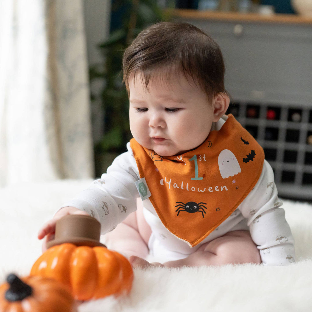 Baby wearing My 1st Halloween orange dribble bib