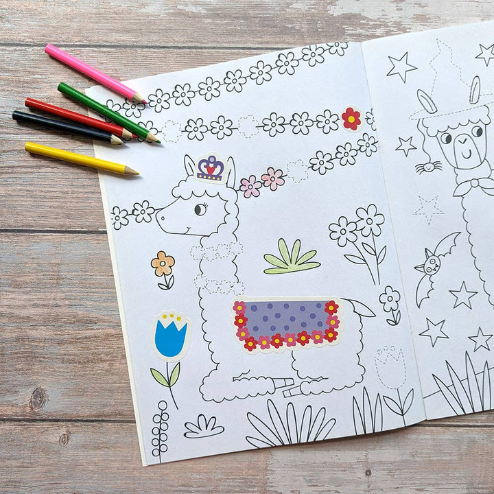 Child using Dress Me Up Llama colouring and activity book