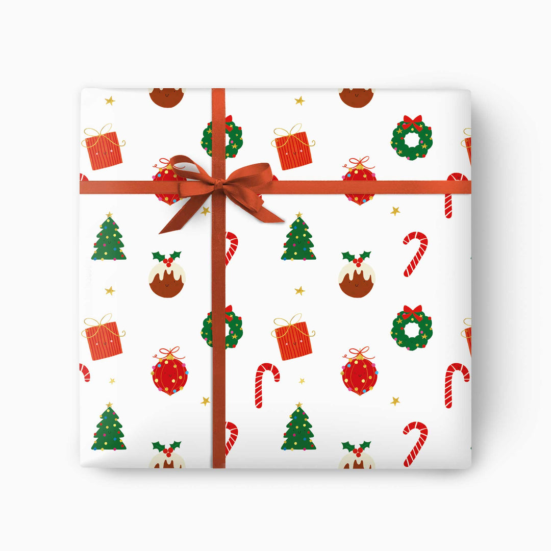 Festive icons Christmas wrapping paper with candy canes, puddings and wreaths