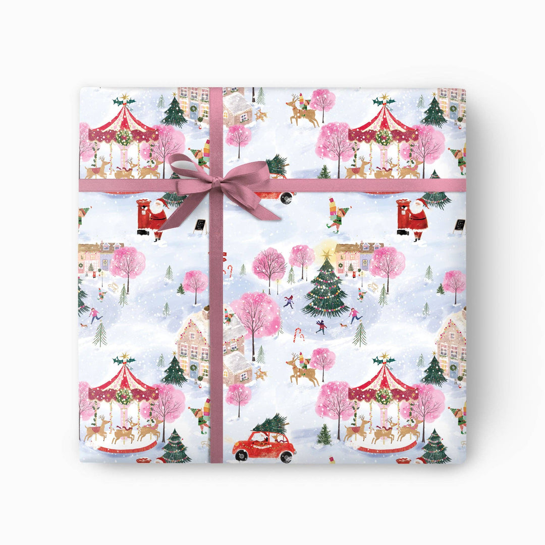 Sugar plum Christmas wrapping paper with snowy village scenes
