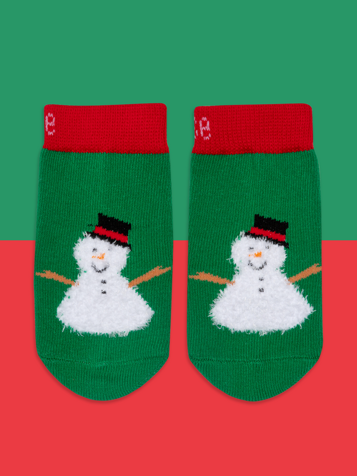 Blade and Rose Snowman Socks in green and white with a cheeky snowman, flat lay