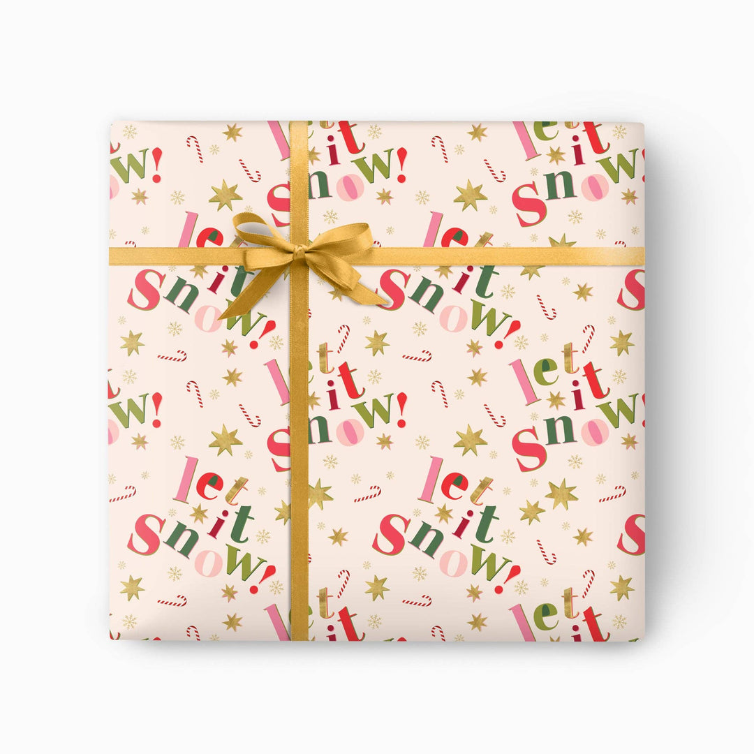 Let It Snow Christmas wrapping paper with gold stars and candy canes