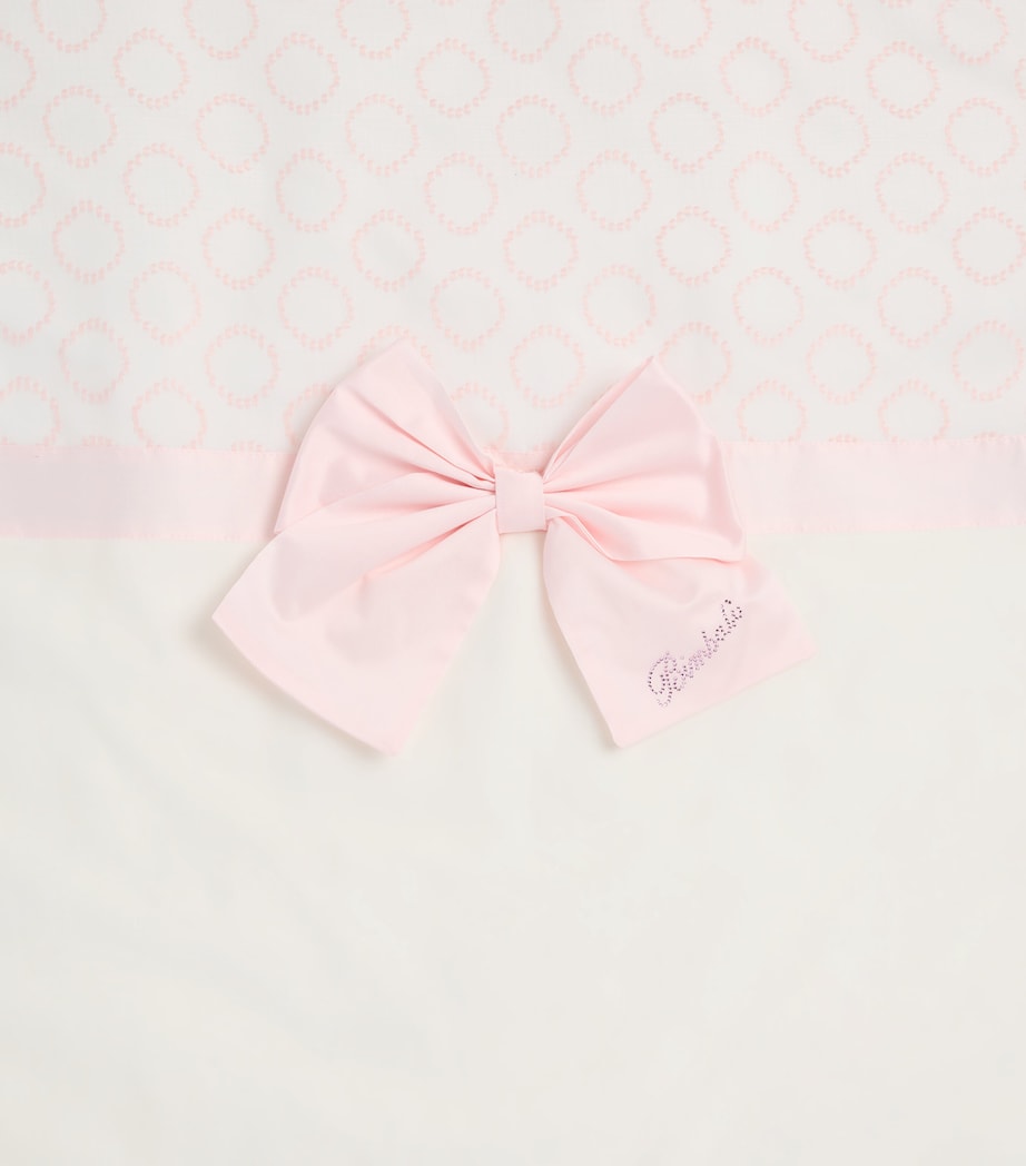 Bimbalò Rosa pink baby blanket with circular jacquard pattern