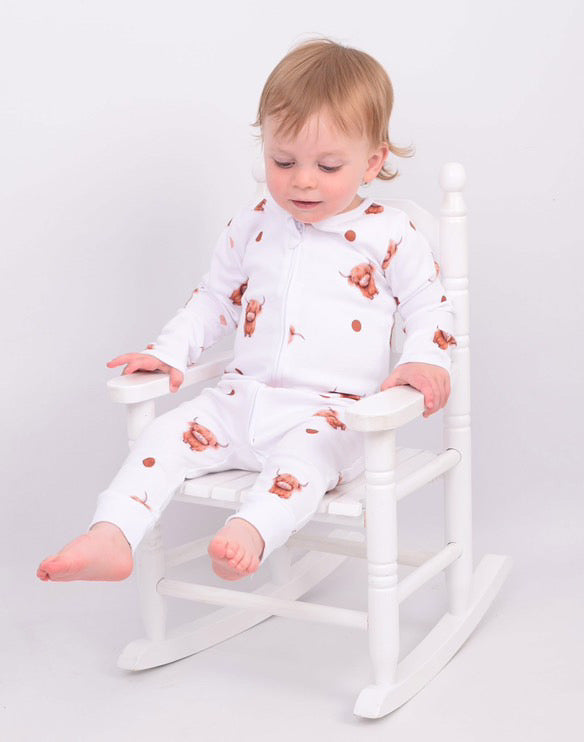 BabyMac Scottish Highland Cow print sleepsuit for babies, front view