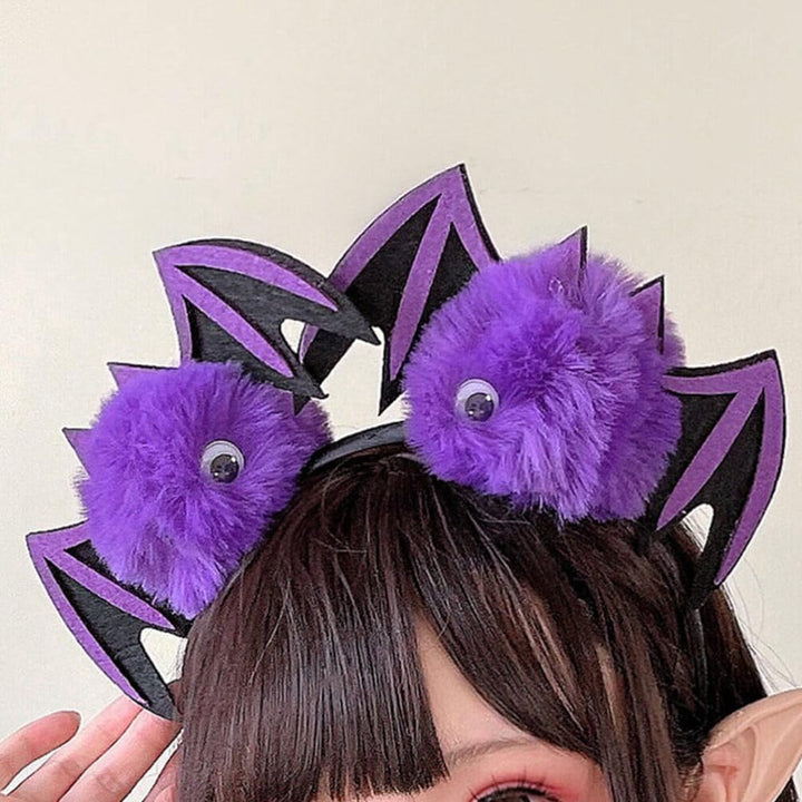 Halloween purple bat headband for kids and adults with googly eyes and felt wings