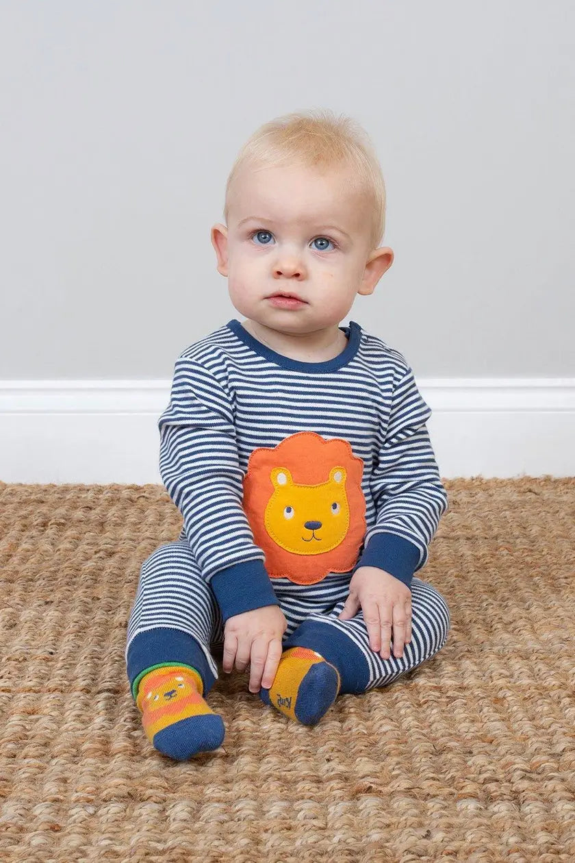 Kite Lionheart romper, detail of lion applique